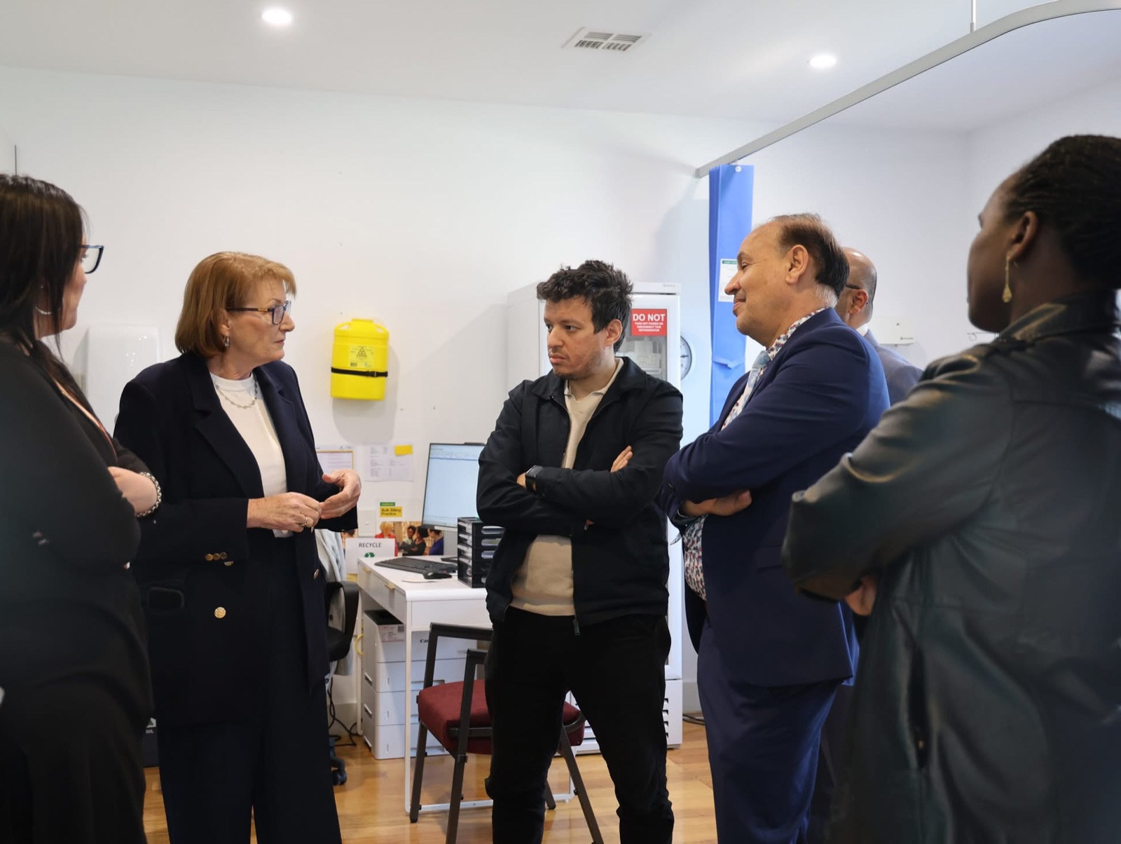 Joanne Ryan MP speaking with the team inside Sunrise Family Medical Centre in Werribee